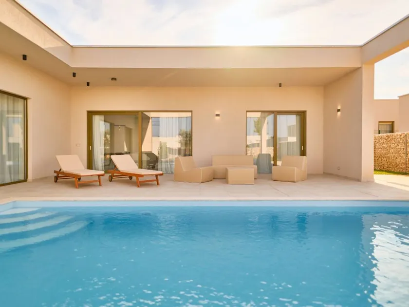 Family-oriented holiday home with garden & private pool | Next to the beach - Image 1