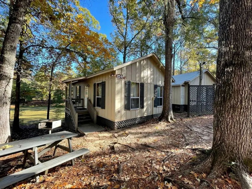 Scenic Waterfront Cabin with Covered Porch Overlooking Private Pond near Zwolle, Louisiana - Image 1