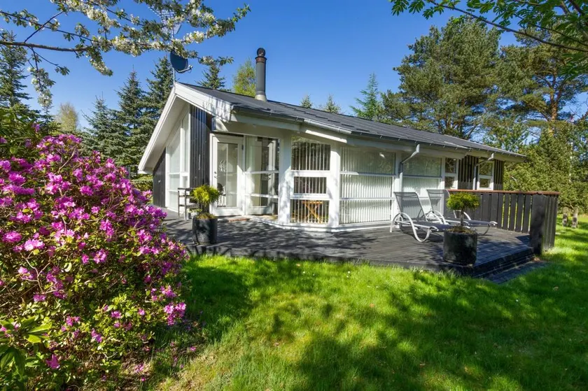 Holiday home with BBQ, sauna & hot tub - Image 1