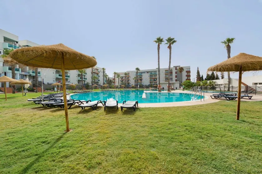 Premium family apartment in Almerimar with garden and pool views - Image 1