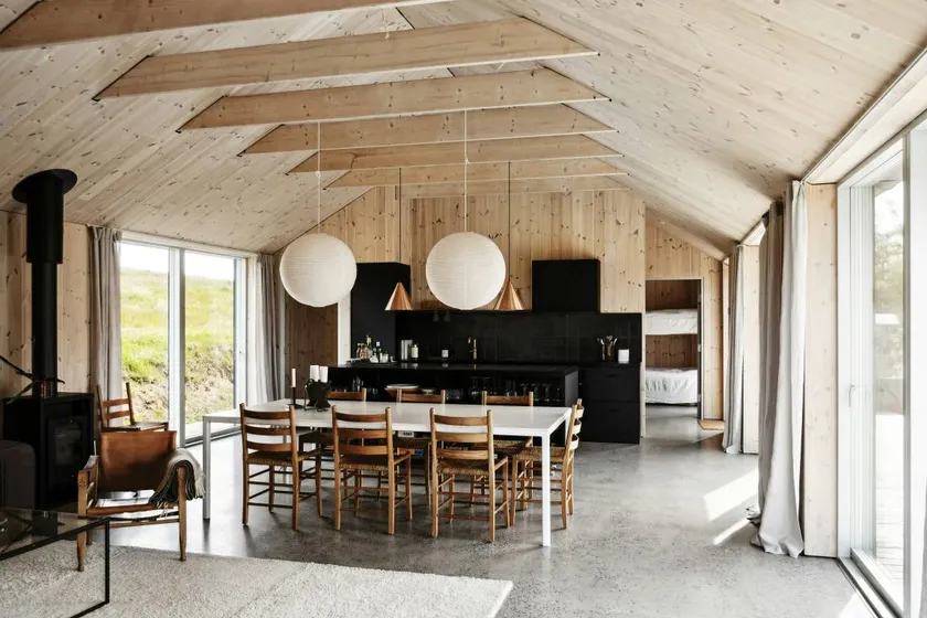 Holiday home with terrace, sauna & hot tub | Water view - Image 1