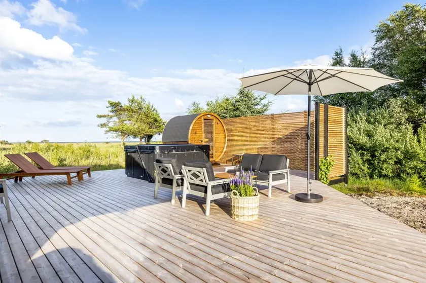Holiday home with sauna, terrace & hot tub | Sea view - Image 1