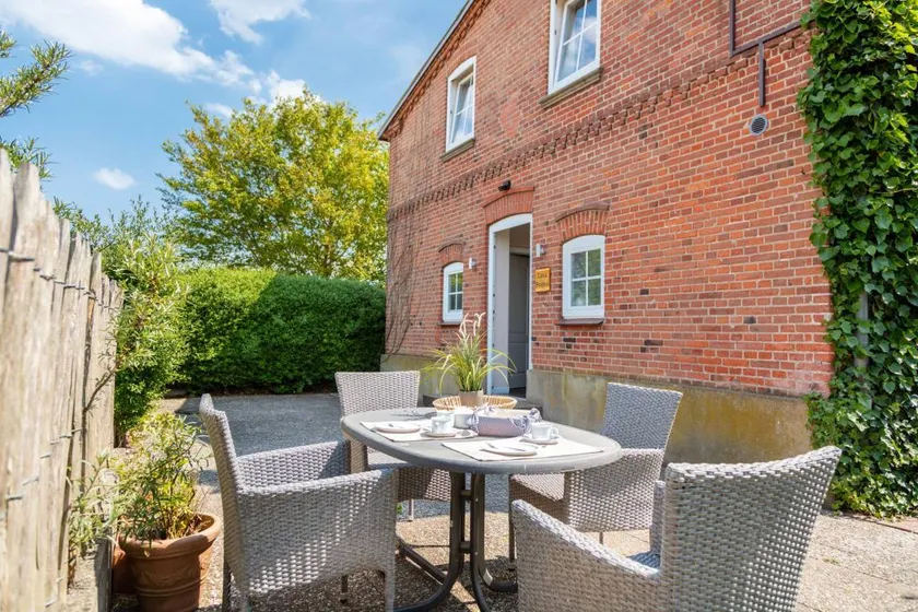 Appartement avec barbecue, jardin et terrasse | Vue jardin - Image 1