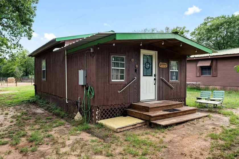 2 Cabin | Tiny Town at Historic Hico Ranch and RV Park & Horse Motel - Image 1
