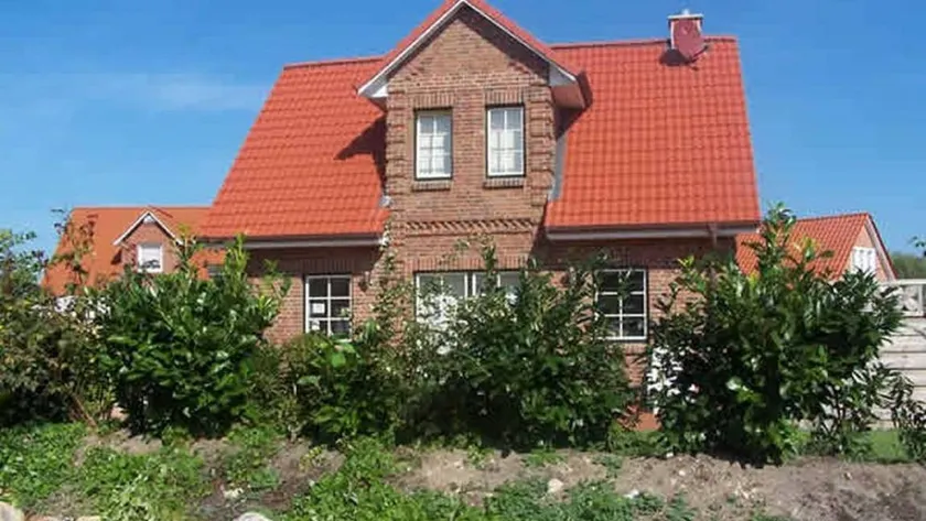 Holiday home with terrace, garden & sauna | Garden view - Image 1