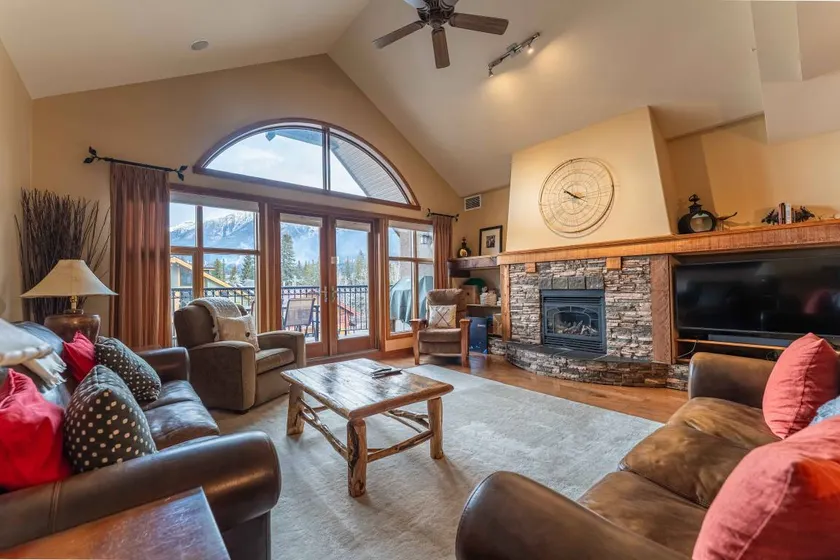 Mountain Views! Stunning Penthouse in Downtown Canmore Balcony + Fireplace - Image 1
