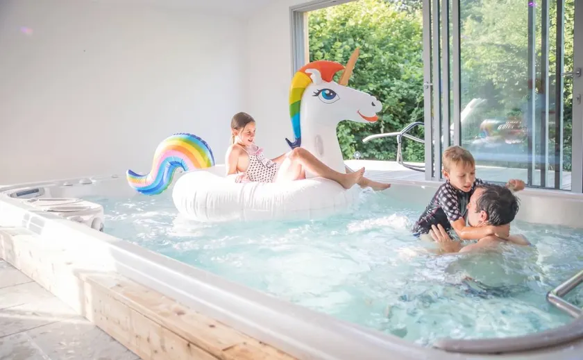 Holiday home with hot tub, terrace & sauna | Garden view - Image 1