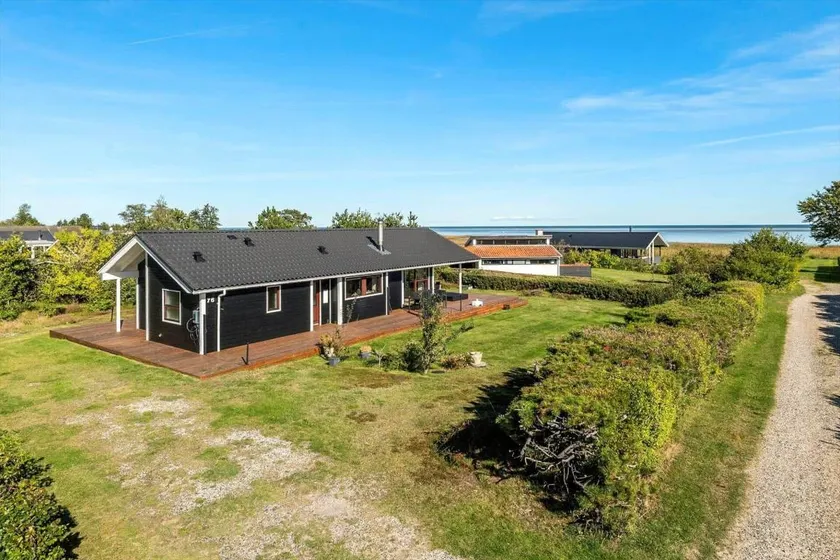 Holiday home with sauna, terrace & BBQ | Sea view - Image 1