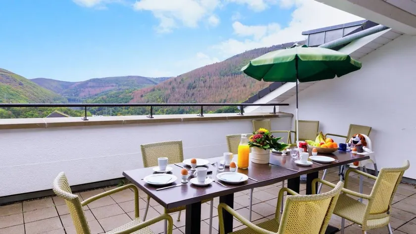 Ferienhaus mit Whirlpool, Pool und Sauna | Bergblick - Image 1