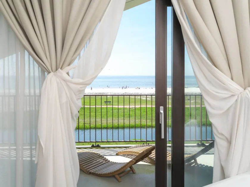Apartamento vacacional totalmente equipado con sauna | Vistas al agua | Al lado de la playa | Se admiten mascotas - Image 1