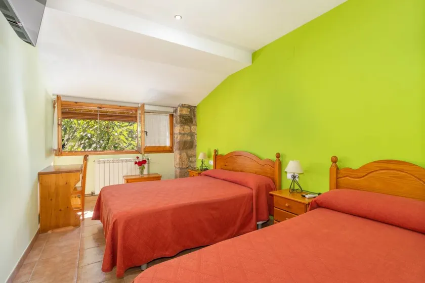 Room 'Habitació Triple' with Mountain View, Wi-Fi and Air Conditioning - Image 1