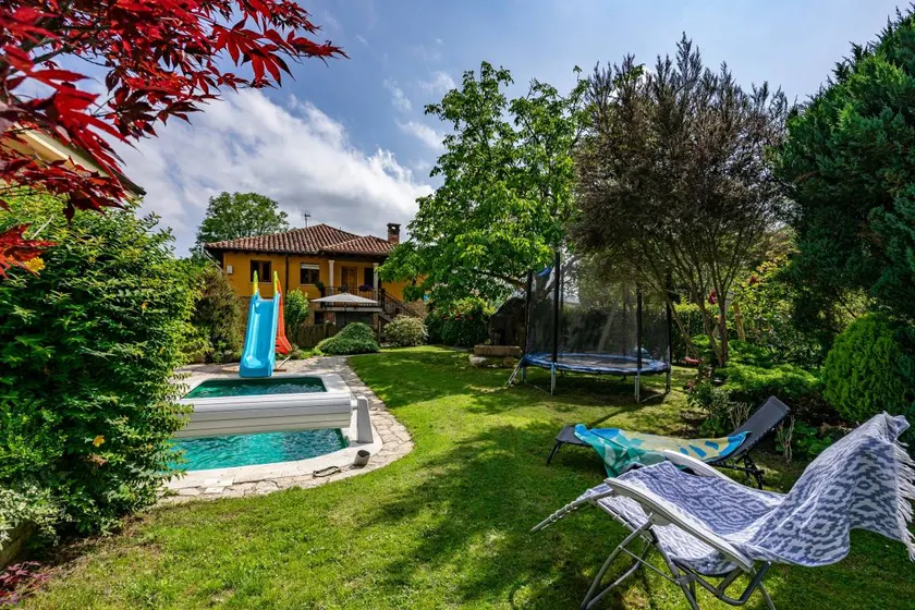 Casa con terrazza, piscina riscaldata e giardino | Vista sul giardino - Image 1