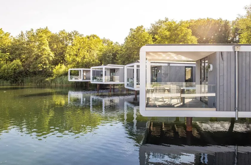 Luxury water cube extending 12 metres into the lake with generous bathroom and air conditioning. A unique holiday experience on the water. - Image 1