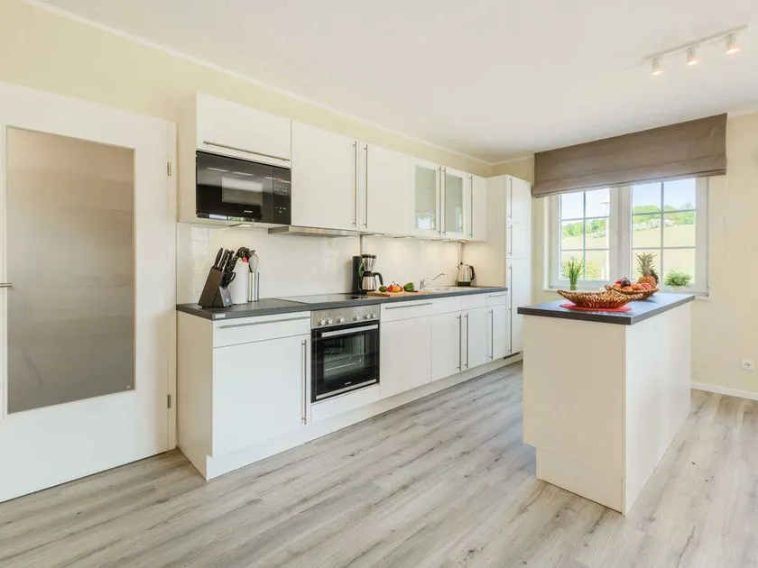 Family-friendly apartment with terrace, barbeque & sauna | Next to the beach - Image 1