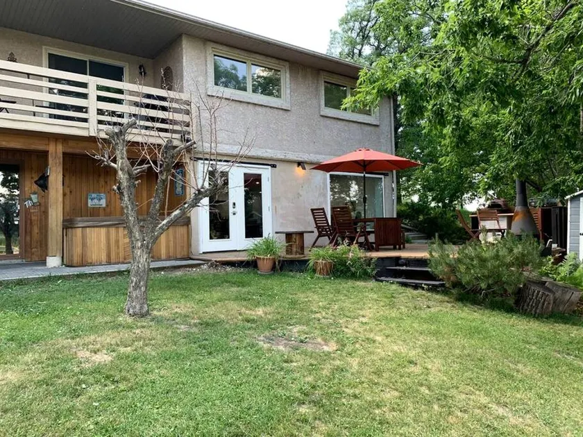 Incredible Waterfront Cottage with Hot-tub, Barbecue and Fire Pit in Portage la Prairie, Manitoba - Image 1