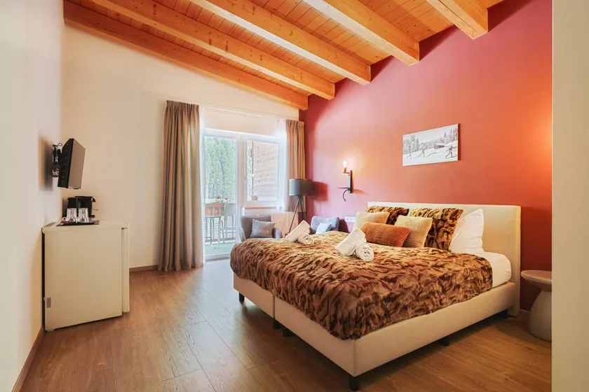 Mountain View Deluxe: Enjoy mountain views together, a balcony, and alpine luxury. Perfect for a romantic stay in summer or winter. - Image 1