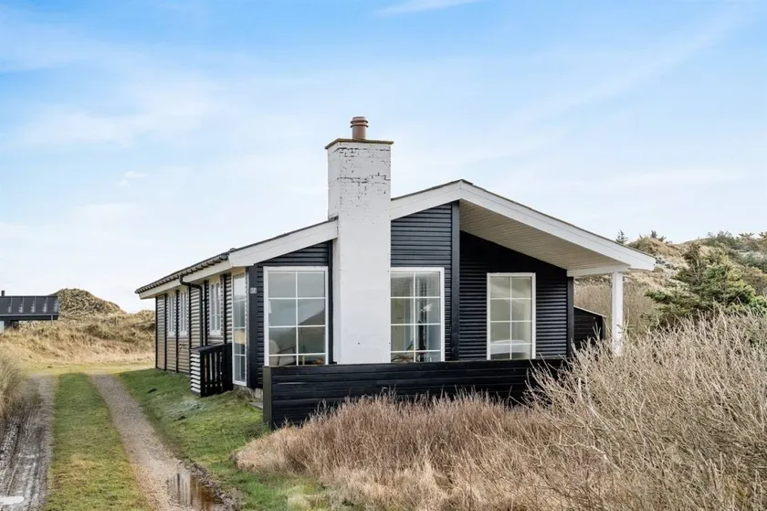 Holiday home with hot tub, terrace & sauna | Sea view - Image 1