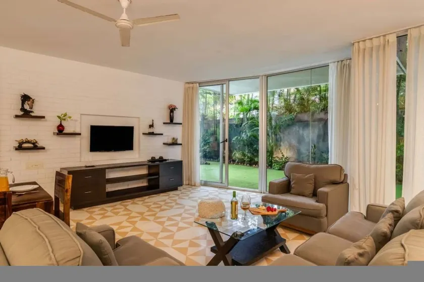 Apartamento vacacional con piscina y jardín - Image 1