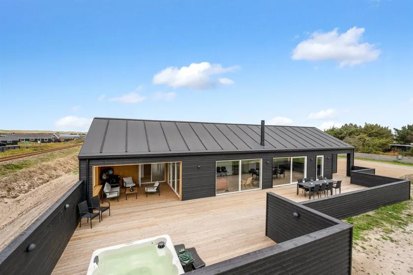 Family-friendly house with terrace, sauna & hot tub | Next to the beach | Dogs allowed - Image 1