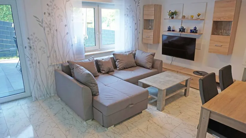 Apartment with garden, terrace & jacuzzi | Garden view - Image 1
