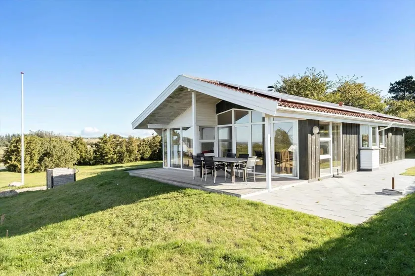 Holiday home with sauna, terrace & BBQ | Sea view - Image 1