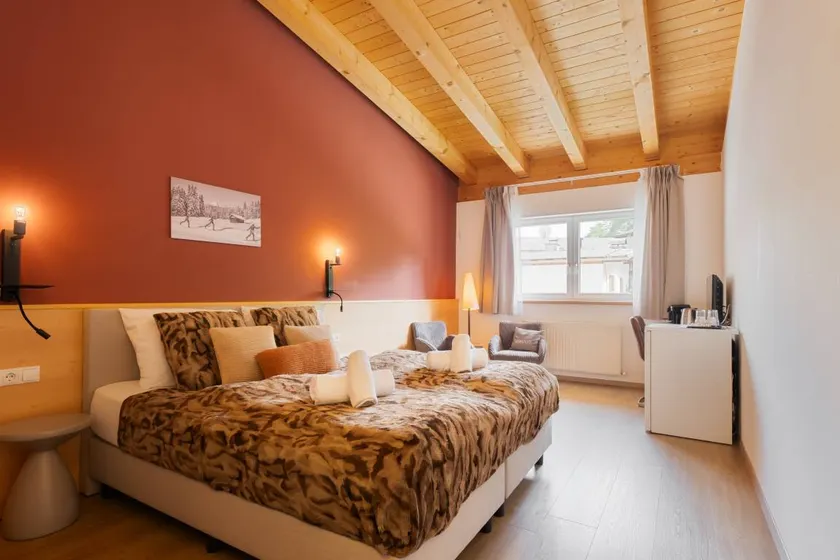 The Leutasch Retreat Comfort room offers peace, style, and comfort after hiking, cycling, or winter sports in the Alps around Seefeld. - Image 1
