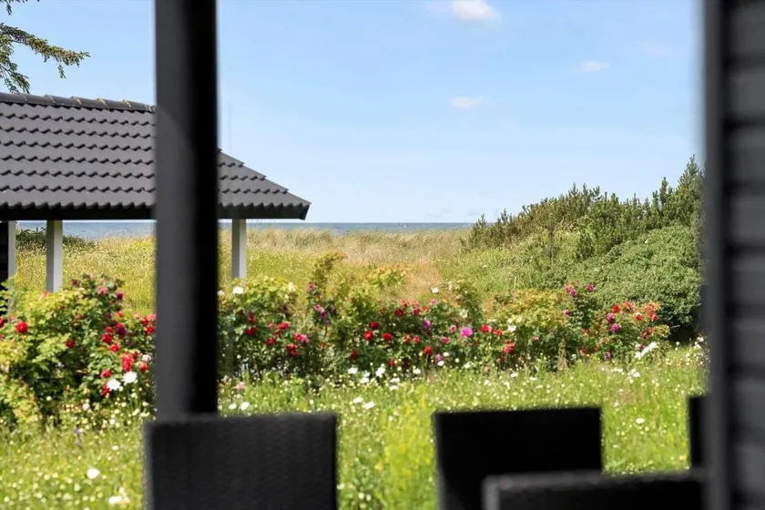 Holiday home with sauna, terrace & garden | Sea view - Image 1