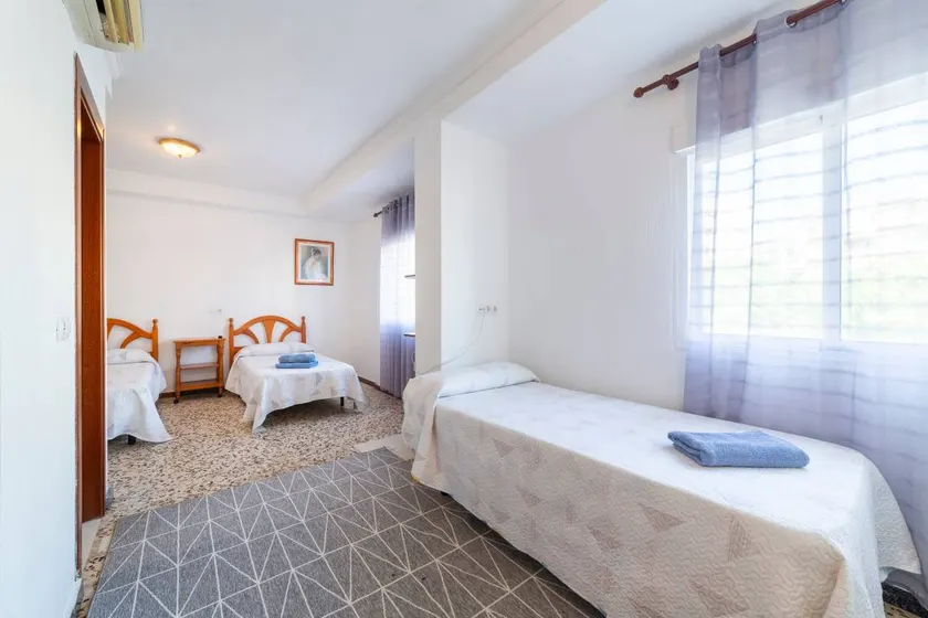 Room 'Habitación Triple' with Wi-Fi and Air Conditioning - Image 1