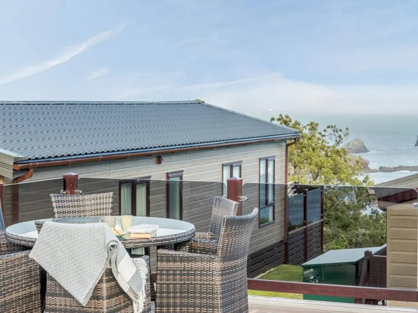 Lodge with pool & garden | Water view - Image 1
