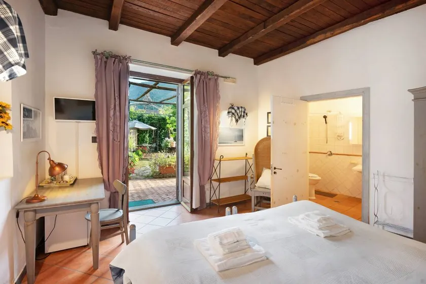 Privatzimmer mit Terrasse, Garten und Pool | Bergblick - Image 1