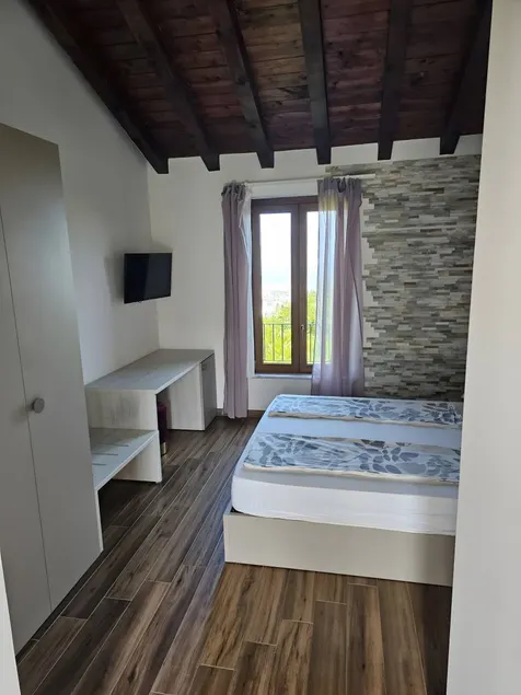 Room 'Camera Matrimoniale' with Sea View, Wi-Fi and Air Conditioning - Image 1