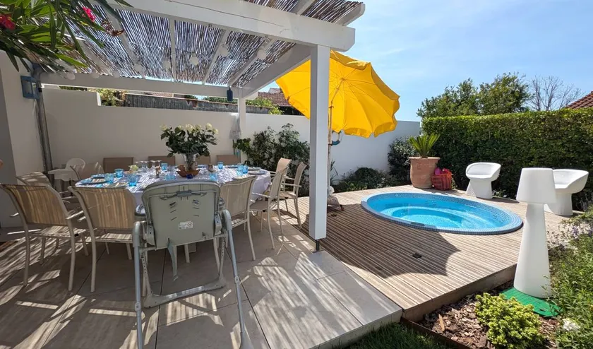 Family-oriented holiday home with terrace, hot tub & garden | Garden view - Image 1