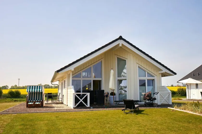 Holiday home with hot tub, garden & barbeque | Sea view - Image 1