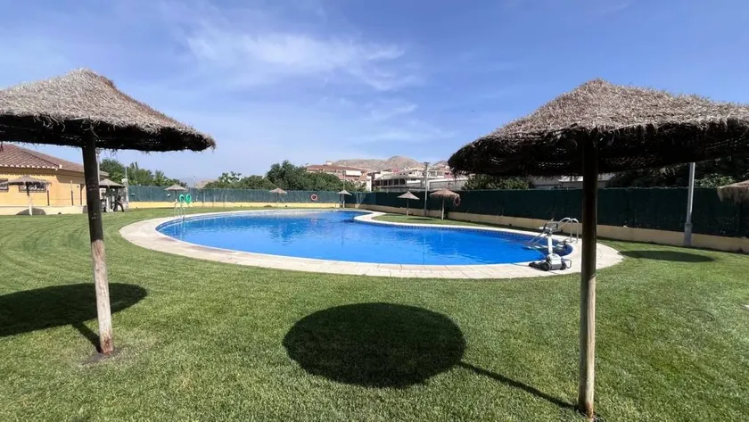 'Ágora Alhambra' Apartment with Mountain Views, Shared Pool, and Air Conditioning - Image 1