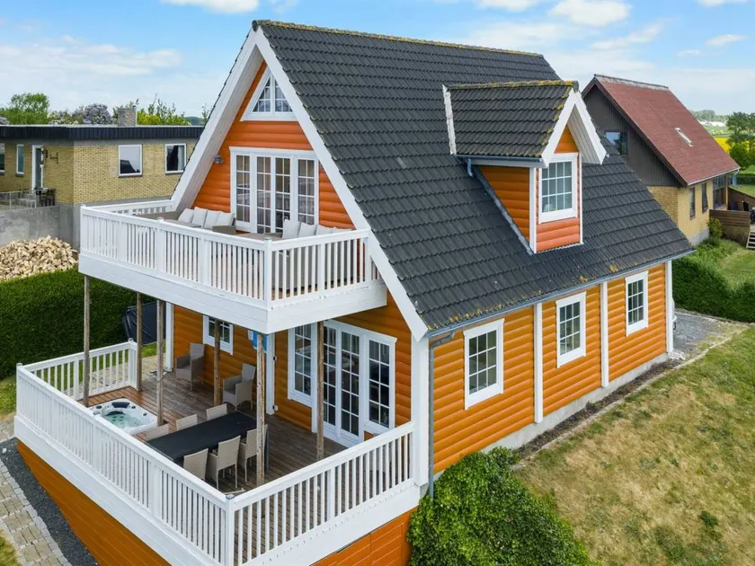 Children-friendly holiday home with hot tub, sauna & terrace | Next to the beach - Image 1