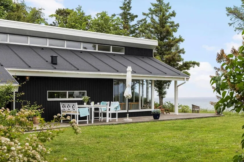 Holiday home with terrace, sauna & barbecue | Sea view - Image 1