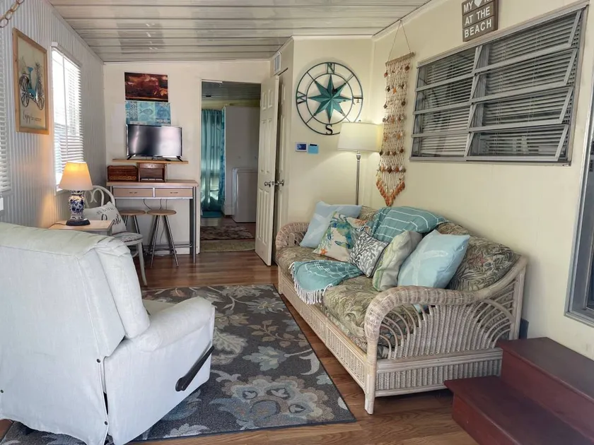 Paradise in this immaculate 2 bed 1 Bath 1978 beach bungalow. - Image 1