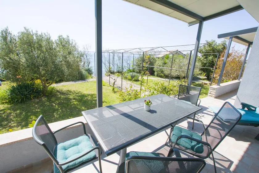 Pleasant holiday apartment with terrace, BBQ & garden | Garden view | Next to the beach - Image 1