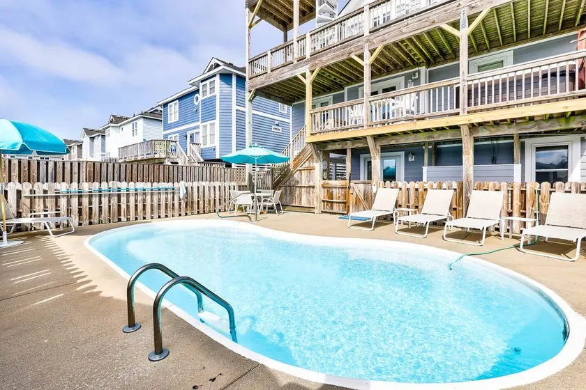 Maison de vacances adaptée aux familles avec jacuzzi, barbecue et piscine privée | Vue sur l'eau | Proche de la plage - Image 1