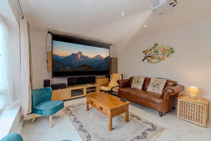 Spacious 3BR Home with Playroom & Free Parking - Image 1