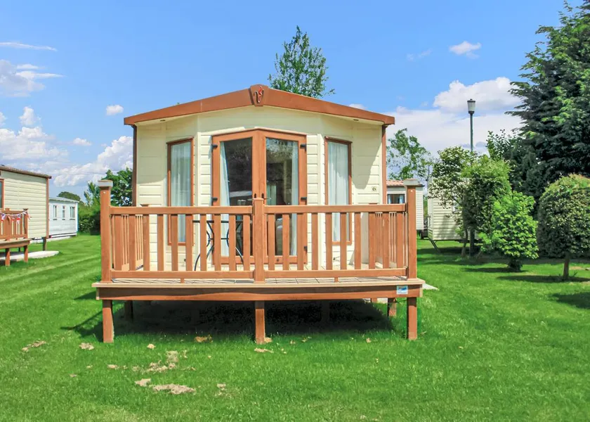 Two bedroom caravan sleeping 4 people with one double and one twin room. - Image 1
