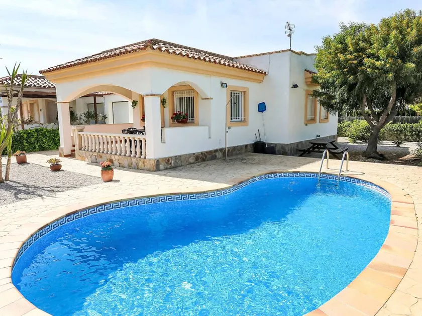 Holiday home with garden, barbecue & private pool - Image 1