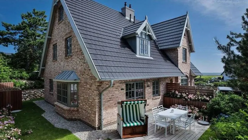 Maison de vacances entièrement équipée avec jardin, sauna et terrasse | À côté de la plage - Image 1