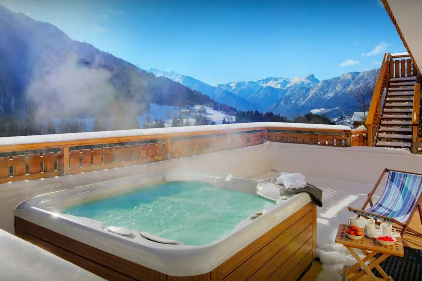 Family-oriented chalet with hot tub, garden & barbeque | Lake view | Good for workation | Dogs allowed - Image 1