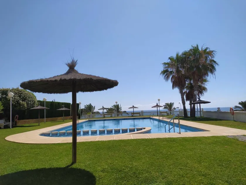 Holiday apartment with terrace, garden & pool | Sea view - Image 1