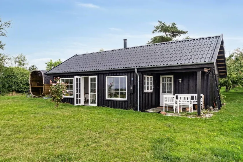 Holiday home with sauna, garden & BBQ | Water view - Image 1