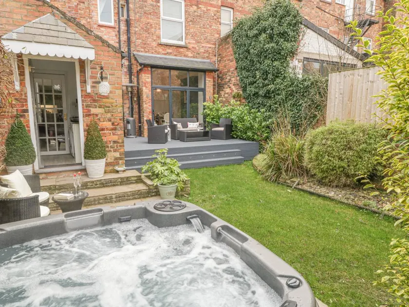 Cottage with terrace, hot tub & garden | Beach view - Image 1