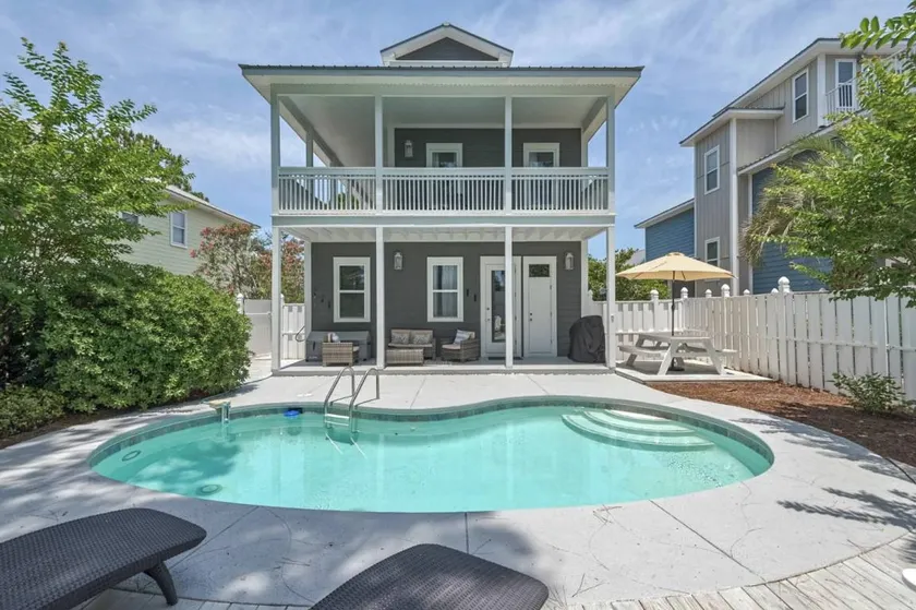 Maison de vacances adaptée aux familles avec jardin, barbecue et piscine privée | Vue sur l'eau | Avec animaux bienvenus - Image 1