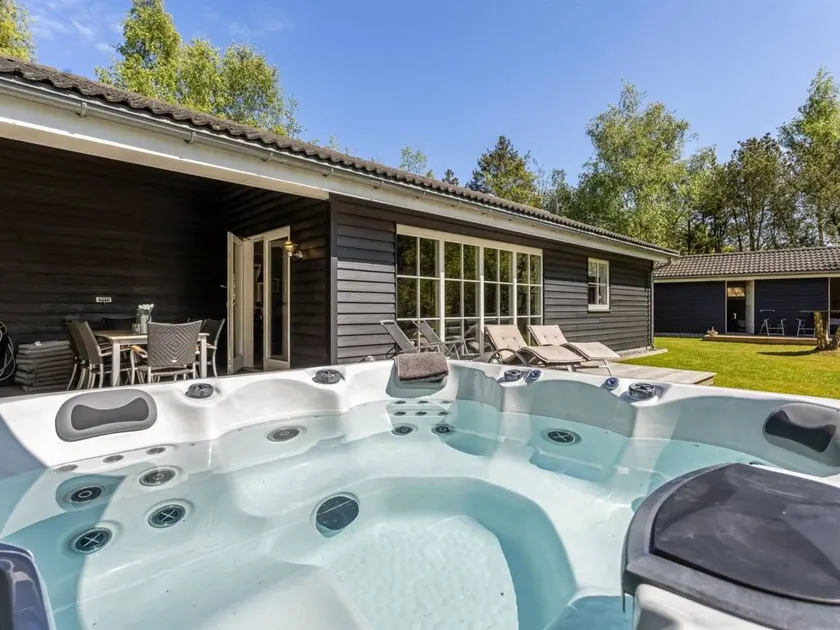 Child-friendly charming holiday home with BBQ, hot tub & terrace | Dogs allowed - Image 1