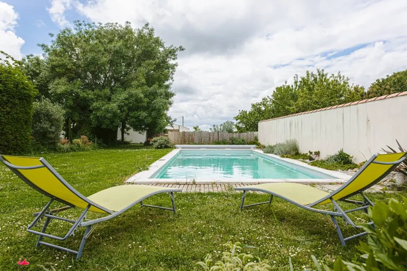 Ferienhaus mit Grill, Terrasse und Pool | Gartenblick - Image 1